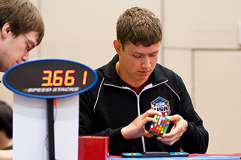 Cuber Kevin Hays solving a Rubik's Cube in competition
